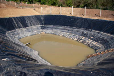 Muddied wastewater pond at construction site