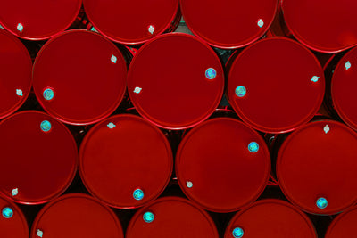 large red containers of toxic waste