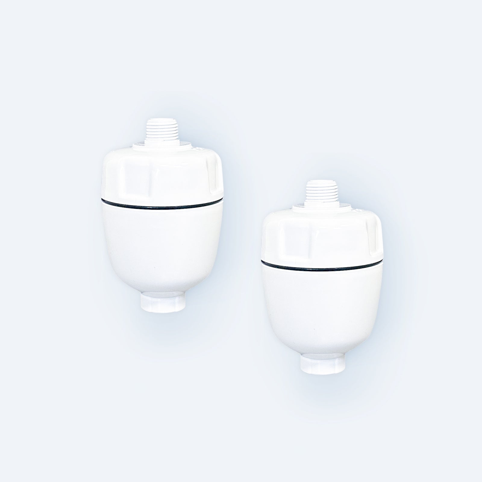 Photo of two Hydroviv In-Line Shower Water Filters on a light grey background