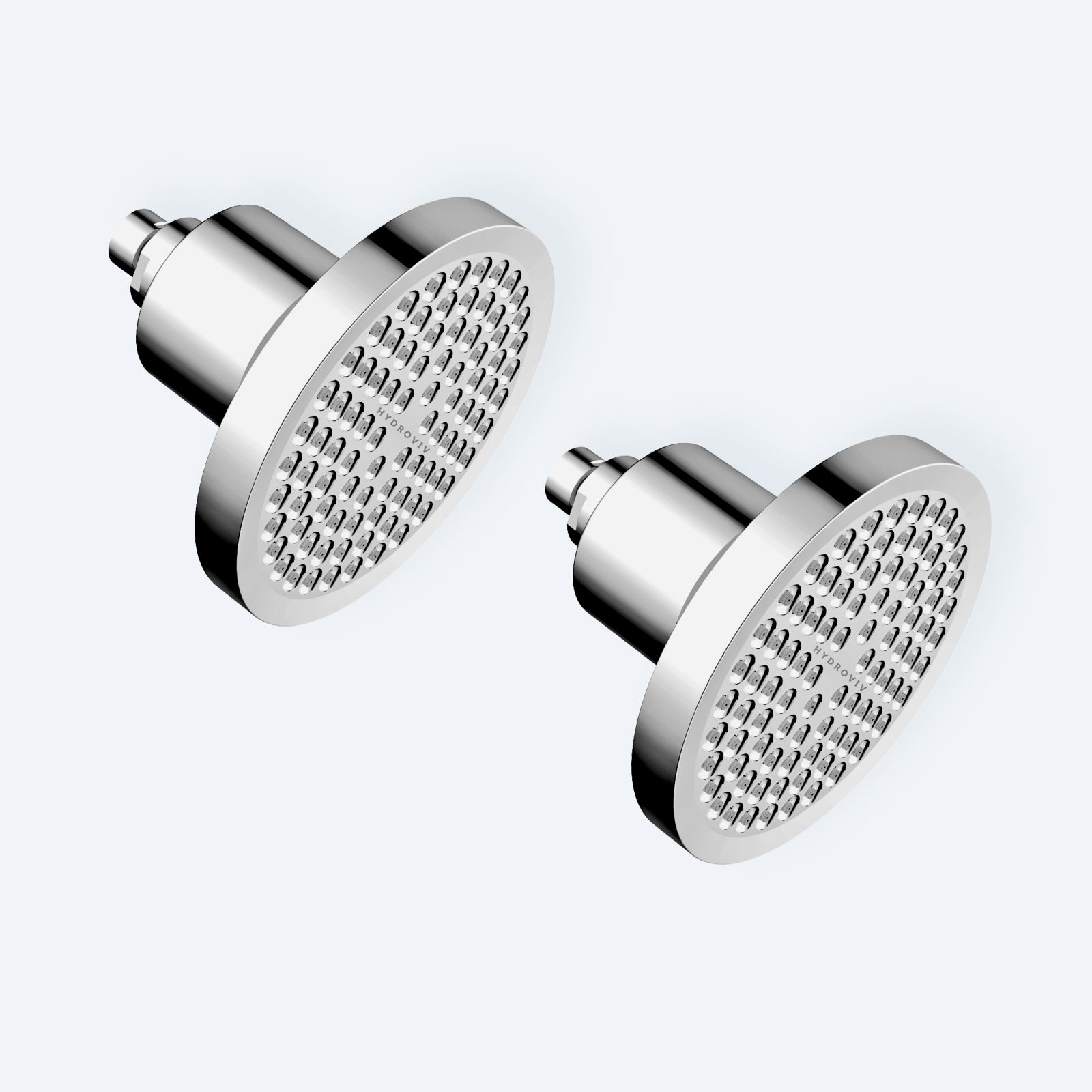 Photo of two chrome Hydroviv filtered showerheads on a light grey background.