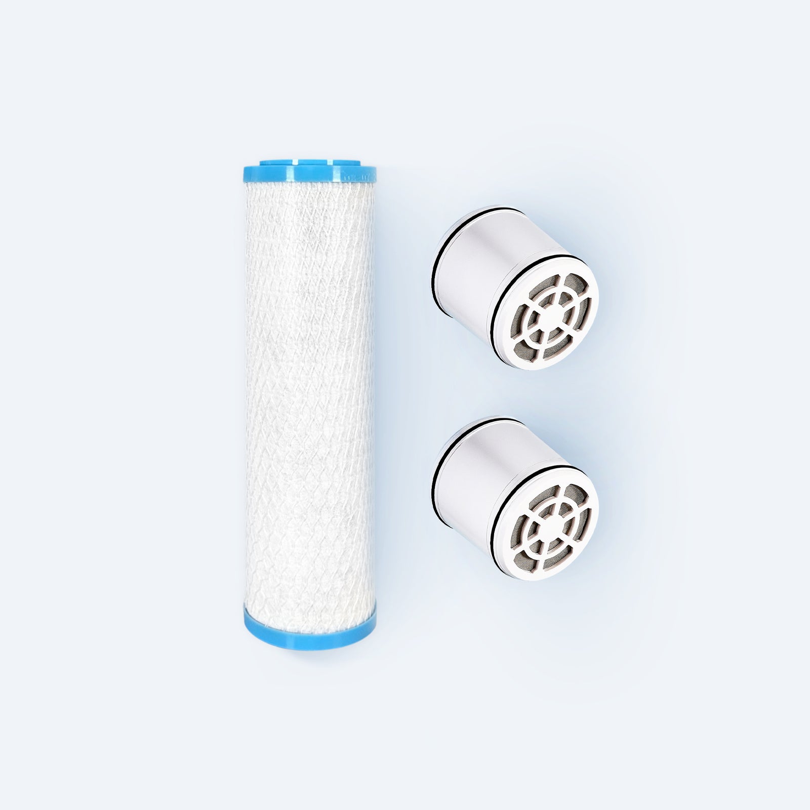 Photo of a replacement filter for the Hydroviv faucet filter and two replacement filters for the Hydroviv filtered showerhead on a grey background.