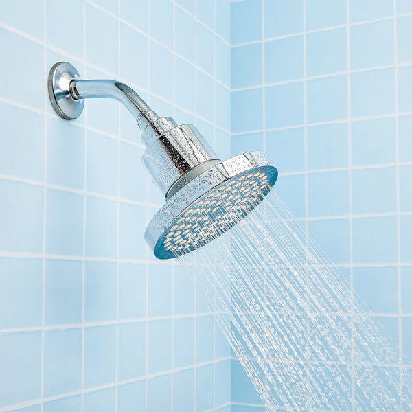 A photo of the Hydroviv Filtered Showerhead in chrome. It's fully installed and running at a high flow rate.