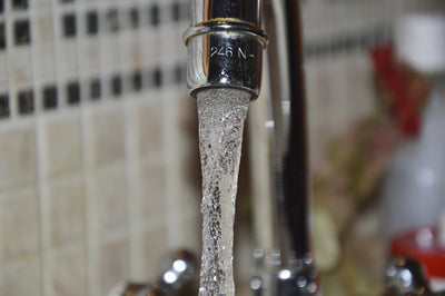 tap water flowing from a faucet