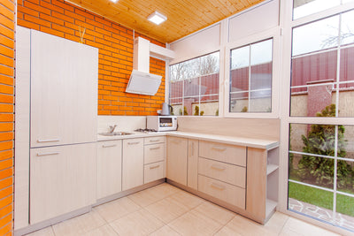 kitchen in small orange apartment 