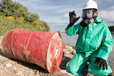 scientist looking at hazardous waste