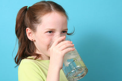 Girl drinking glass of water