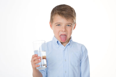 Child reacting to bad tasting water