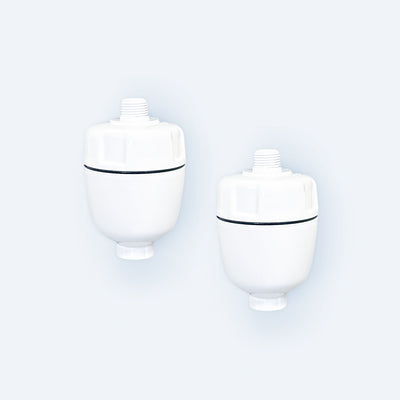Photo of two Hydroviv In-Line Shower Water Filters on a light grey background