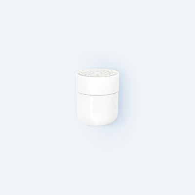 Photo of the Hydroviv in-line shower filter replacement filter on a light grey background